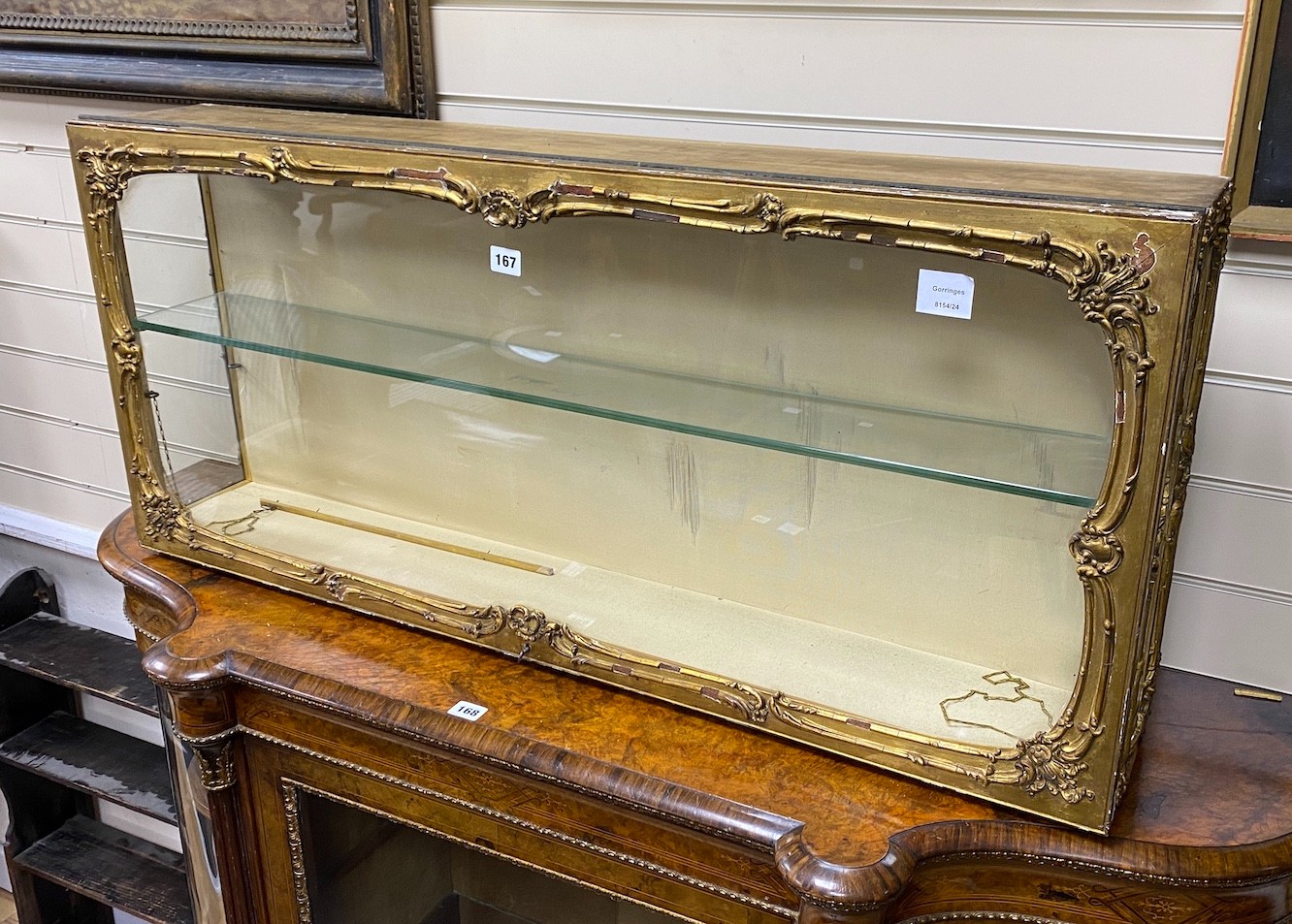 A 19th century giltwood and composition display case, width 110cm, depth 19cm, height 50cm